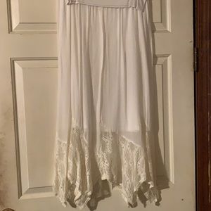 Flowy white asymmetric skirt